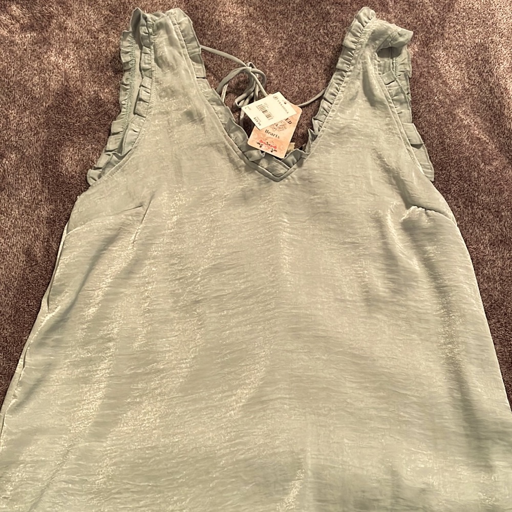 Ruffled silk tank with tie in the back